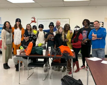 Students at Erie 1 BOCES EDGE Academy pose with members of LIUNA Laborers Local 210 as part of the Worker Empowerment Center's pilot labor education program.